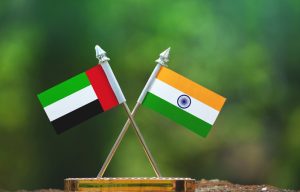 India,And,United,Arab,Emirates,Small,Flag,With,Blur,Green