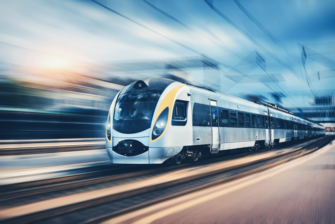 High,Speed,Passenger,Train,In,Motion,On,The,Railway,Station
