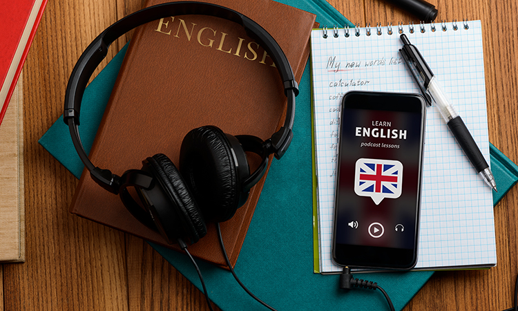 Listening,To,English,Speech.,Using,Podcast,App,And,Headphones,For