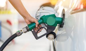 Hand,Man,Refill,And,Filling,Oil,Gas,Fuel,At,Station.