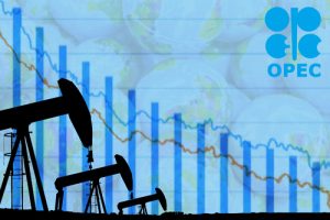 Silhouette,Industrial,Oil,Pump,Jack,And,Falling,Oil,Graph,On