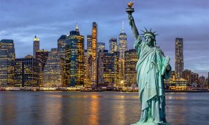 The,Statue,Of,Liberty,Over,The,Scene,Of,New,York