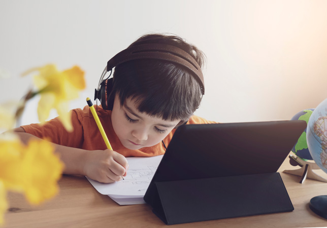 Kid,Self,Isolation,Using,Tablet,For,His,Homework,child,Doing,Using