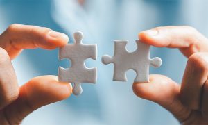 Business,Woman,Person,Hand,Holding,Puzzle,Piece,Idea,For,Strategy