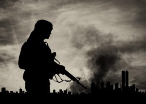 Concept,Of,Terrorism.,Silhouette,Terrorist,On,City,Background,In,Smoke