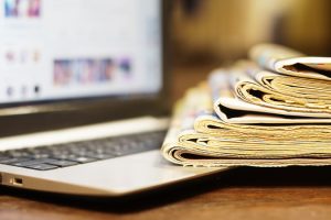 Newspapers,And,Laptop.,Different,Concepts,For,News,-,Social,Network