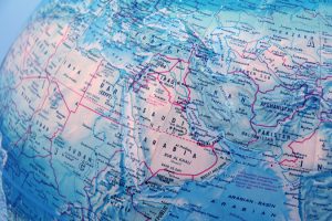 Closeup,Of,World,Globe,Focused,On,Middle,East,With,Blue