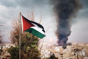The,Flag,Of,Palestine,On,The,Mountain,On,The,Background
