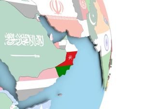Oman with flag on globe