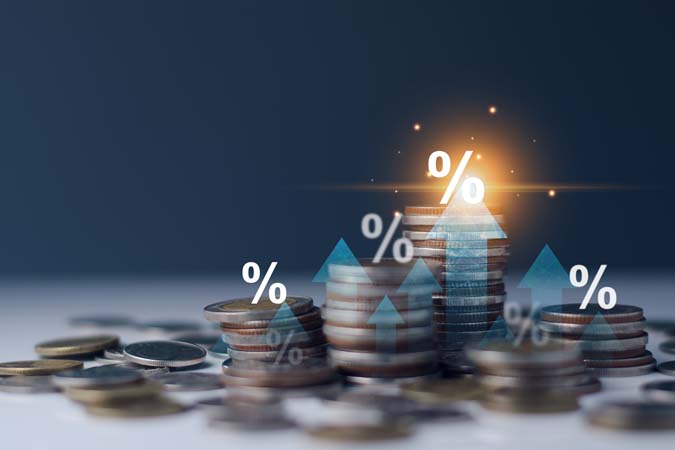 Interest,Rate,And,Dividend,Concept.,Businessman,With,Percentage,Symbol,And