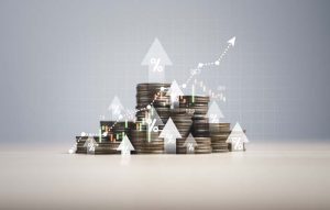 Heap of coins money with up arrow and stock market chart for financial banking increase interest rate or mortgage investment dividend from business growth concept.