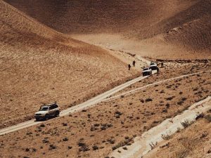 Armed,Military,Unit,Patrolling,A,Mountainous,Valley,In,Meymaneh,,Afghanistan.