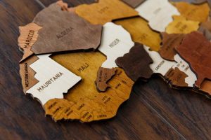 Wooden,World,Map,On,A,Dark,Background.,Handmade.,Plywood.,In