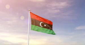 Libya,National,Flag,Waving,In,Beautiful,Sky.,The,Flag,Waving