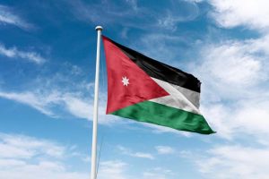 Jordan,Flag,Waving,At,Cloudy,Sky,Background.,Kingdom,Of,Jordan