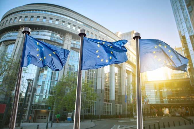 European,Union,Flag,Against,Parliament,In,Brussels,,Belgium