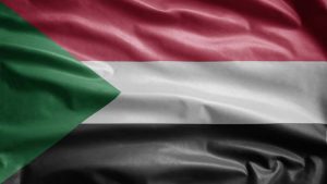 Sudanese,Flag,Waving,In,The,Wind.,Close,Up,Of,Sudan