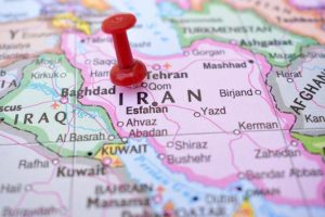 Red,Push,Pin,Pointing,On,Iran,The,Political,World,Map