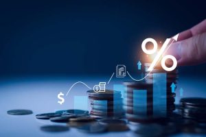 Interest,Rate,And,Dividend,Concept.,Businessman,With,Percentage,Symbol,And
