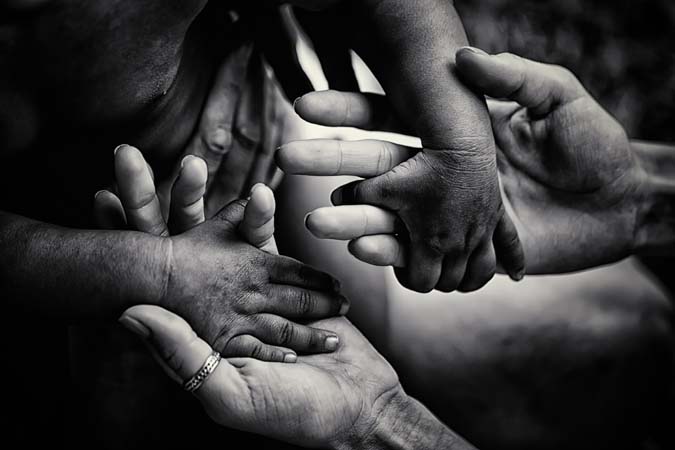Helping,Children.,Volunteer.,Adult,Holding,Smal,Hands,Of,Little,African