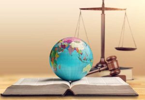 World,Globe,,Wooden,Gavel,For,Law,International,Concept