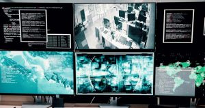 Computer,,Screen,And,Satellite,For,Global,Security,Of,Crime,Surveillance,